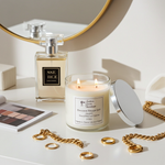 Load image into Gallery viewer, 2 wick hand poured Baccarat Rouge 540 Candle, perfume bottle, and jewelry on a table with a mirror in the background. Southern Charm Farmhouse.