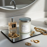 Load image into Gallery viewer, 2 Wick Candle, perfume bottle, and jewelry on a reflective surface with a mirror in the background. Southern Charm Farmhouse.