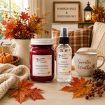 Load image into Gallery viewer, Two Southern Charm Farmhouse hand poured candle and Room Spray displayed on a tabletop: a red wax candle labeled Fireside Glow and a clear room spray bottle labeled Cedar & Autumn Leaves, styled with fall leaves, a mug, knit blanket, pumpkins, and a cozy indoor background.