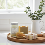 Load image into Gallery viewer, Green Tea 16 oz Mason jar hand poured Candle, soap, and scrub brush on a wooden tray with a plant in the background. Southern Charm Farmhouse
