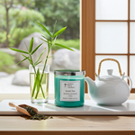 Load image into Gallery viewer, 2 wick hand poured Green Tea-themed candle, teapot, and glass with bamboo on a wooden surface. Southern Charm Farmhouse.