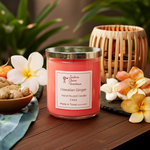 Load image into Gallery viewer, Pink 2 wick hand poured Hawaiian Ginger candle on a wooden surface with flowers and ginger. Southern Charm Farmhouse.