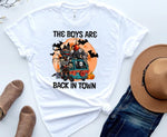Load image into Gallery viewer, White t-shirt with Halloween-themed graphic and text 'The Boys Are Back in Town' on a white background. Southern Charm Farmhouse.