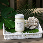 Load image into Gallery viewer, 16 oz Mason Jar Cheirosa 62 hand poured candle with label on a white tray with green leaves and coral decor. Southern Charm Farmhouse.