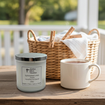 Load image into Gallery viewer, Sunwashed Linen scented 2-wick candle in a clear glass jar with notes of clean cotton and fresh air - Southern Charm Farmhouse