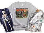 Load image into Gallery viewer, A gray t shirt with Halloweentown graphic surround by blue jeans with a skeleton on it, spiderwebs, with spiders and gray & white tennis shoes. Southern Charm Farmhouse.