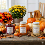 Load image into Gallery viewer, Three hand poured candles with labels on a wooden table with pumpkins and flowers in the background.  Southern Charm Farmhouse.
