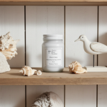 Load image into Gallery viewer, 16 oz Mason Jar Black Sea Candle with a label on a wooden shelf with decorative shells and a bird figurine. Southern Charm Farmhouse
