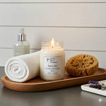Load image into Gallery viewer, 16 oz Mason jar hand poured Black Sea Candle, towel, and sponge on a wooden tray with a white background. Southern Charm Farmhouse.
