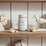 Load image into Gallery viewer, 16 oz hand poured Black Sea Candle in a mason jar labeled 'Black Sea' on a wooden shelf with seashells and a ceramic bird. Southern Charm Farmhouse.
