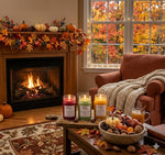 Load image into Gallery viewer, Cozy living room with fireplace, three hand poured 16 oz mason jar candles labeled Fireside Glow, Cedar &amp; Autumn Leaves and Fall Festival with autumn decorations.  Southern Charm Farmhouse.

