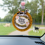 Load image into Gallery viewer, Car freshie with 'dog mom' text hanging from a car's rearview mirror, with dogs playing in the background. Southern Charm Farmhouse.
