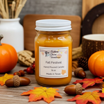 Load image into Gallery viewer, 16 oz Mason Jar of 'Fall Festival' hand poured candle with autumn-themed decorations on a wooden surface.  Southern Charm Farmhouse.
