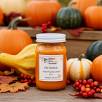 Load image into Gallery viewer, 16 oz Mason Jar of 'Fall Festival' hand poured candle surrounded by pumpkins and gourds on a wooden surface.  Southern Charm Farmhouse.
