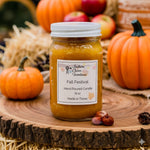 Load image into Gallery viewer, 16 oz mason Jar of 'Fall Festival' hand poured candle with pumpkins and apples in the background.  Southern Charm Farmhouse.
