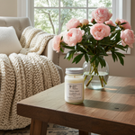 Load image into Gallery viewer, Sweet Grace 16 oz Mason jar hand poured Candle and vase with pink flowers on a wooden table in a cozy living room. Southern Charm Farmhouse
