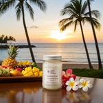 Load image into Gallery viewer, Hawaiian Ginger Candle in a 16 oz Mason Jar sitting at a resort with fruit and flowers beside it and a sunset and beach backdrop. Southern Charm Farmhouse.
