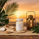 Load image into Gallery viewer, 16 oz Mason jar Hawaiian Ginger hand poured Candle and lantern on a table with a sunset over water background. Southern Charm Farmhoue.
