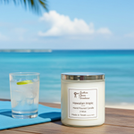 Load image into Gallery viewer, Hawaiian tropical 2 wick candle and glass of lemonade on a beach setting. Southern Charm Farmhouse.
