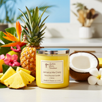 Load image into Gallery viewer, 2 Wick hand poured Jamaica Me Crazy candle with pineapple, coconut beside it on a white countertop. Southern Charm Farmhouse.

