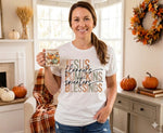 Load image into Gallery viewer, Woman holding a mug with a fall-themed design Jesus, flannels, Pumpkins, sweaters, blessings shirt in a cozy living room. Southern Charm Farmhouse.
