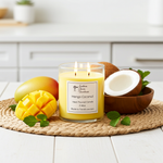 Load image into Gallery viewer, 2 wick hand poured Candle labeled 'Mango Coconut' with mango, coconut, and kiwi on a woven mat. Southern Charm Farmhouse.
