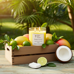 Load image into Gallery viewer, 2 wick hand poured Mango Coconut Candle in a wooden crate with fruits and leaves on a wooden surface outdoors. Southern Charm Farmhouse.
