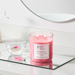 Load image into Gallery viewer, Pink 2 wick hand poured Pink Sands  candle with a label on a reflective surface. Southern Charm Farmhouse.
