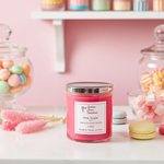 Load image into Gallery viewer, Pink 2 wick hand poured candle labeled 'Pink Sugar' on a table with candy-themed decor. Southern Charm Farmhouse.
