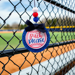 Load image into Gallery viewer, Decorative car freshie with 'Pitch Please' text on it hanging on a chain-link fence at a baseball field. Southern Charm Farmhouse.
