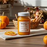 Load image into Gallery viewer, 16 oz mason Jar of 'Pumpkin Pickin' hand poured candle with pumpkins and autumn decorations in the background.  Southern Charm Farmhouse.
