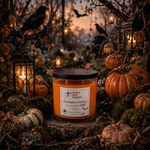 Load image into Gallery viewer, A candle jar labeled 'Pumpkin Hollow' by Southern Charm Farmhouse placed in a Halloween-themed outdoor scene with pumpkins, lanterns, moss, and crows.
