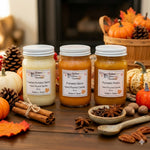 Load image into Gallery viewer, Three 16 oz mason jar candles on a wood surface with fall decoration in the background. Candles labeled Toasted Pumpkin Spice, Pumpkin Spice and Pumpkin Pickin.  Southern Charm Farmhouse.
