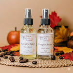Load image into Gallery viewer, Two bottles of Southern Charm Farmhouse pumpkin-themed room and linen sprays on a woven mat with pumpkins and leaves.  Southern Charm Farmhouse.
