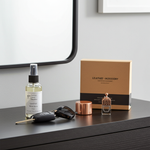 Load image into Gallery viewer, 4 oz Room Spray and car perfume sitting on an entry table with keys. Southern Charm Farmhouse.
