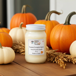 Load image into Gallery viewer, 16 oz Mason Jar of 'Toasted Pumpkin Spice' hand poured candle surrounded by pumpkins on a wooden surface.  Southern Charm Farmhouse.
