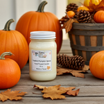 Load image into Gallery viewer, 16 oz Mason Jar of toasted pumpkin spice hand poured candle surrounded by pumpkins and fall decor on a wooden surface.  Southern Charm Farmhouse.
