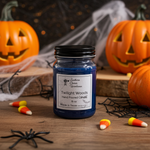 Load image into Gallery viewer, Hand poured Candle jar labeled 'Twilight Woods' with Halloween decorations including pumpkins and candy corn on a wooden surface. Southern Charm Farmhouse.
