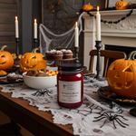 Load image into Gallery viewer, Halloween-themed table setting with candles, pumpkins, and a hand poured red candle labeled 'Vampire's Blood'. Southern Charm Farmhouse.
