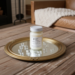 Load image into Gallery viewer, 16 oz. Mason Jar Baccarat Rouge 540 Candle on a decorative tray with a cozy indoor setting
