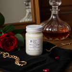 Load image into Gallery viewer, 16 oz Candle Baccarat Rouge with a red rose and decanter in the background
