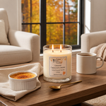 Load image into Gallery viewer, Hand poured Caramel Cappuccino Bruelee Candle, cup of coffee, and dessert on a table with autumn scenery outside a window. Southern Charm Famrhouse.
