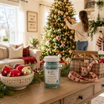 Load image into Gallery viewer, Christmas Tree candle beside an ornament box and ribbon during Christmas tree decorating in a bright festive home. Southern Charm Farmhouse.
