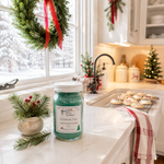 Load image into Gallery viewer, Christmas Tree candle by a sunny farmhouse kitchen window with Christmas wreath, red ribbon, greenery and holiday cookies. Southern Charm Farmhouse.
