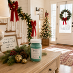 Load image into Gallery viewer, Christmas Tree candle on a farmhouse entry table with Christmas greenery, brass bells, red bows and decorated staircase. Southern Charm Farmhouse.
