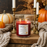 Load image into Gallery viewer, Hand poured Candle with a label named Fireside Glow in a cozy setting with pumpkins and candles. Southern Charm Farmhouse.
