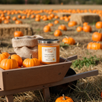 Load image into Gallery viewer, 2 wick cylinder jar of a pumpkin pickin hand poured candle on a wooden cart with pumpkins in a field.  Southern Charm Farmhouse.
