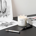 Load image into Gallery viewer, Santal 33 2 Wick hand poured Candle with a label on a desk with stationery items and a cityscape drawing. Southern Charm Farmhouse.
