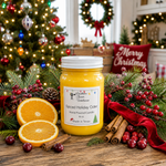 Load image into Gallery viewer, A hand-poured candle in a clear glass jar filled with bright yellow wax, labeled 'Spiced Holiday Cider' by Southern Charm Farmhouse. The candle is styled on a rustic wooden table with Christmas decorations, including pine branches, red berries, cinnamon sticks, and sliced oranges, with a decorated Christmas tree in the background.
