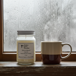 Load image into Gallery viewer, Strongly scented Storm Watch Mason jar candle with a custom wax blend for maximum room-filling fragrance. Southern Charm Farmhouse.
